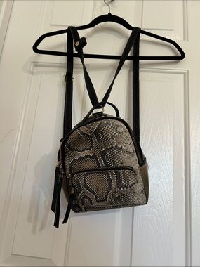free people mini backpack snake print Off-White Nylon Python Fluo Yellow Black 1804340 FASHIONPHILE A backpack just big enough for keeping it light SNAKE SKIN MINI BACKPACK -